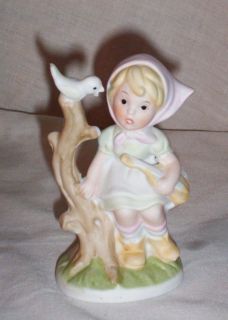 VINTAGE PORCELAIN FIGURINE of GIRL ON TREE BRANCH WITH BIRD