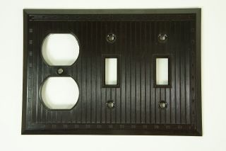   New Deco Ribbed Brown Bakelite 3 gang 1 outlet 2 Switch Plate NOS