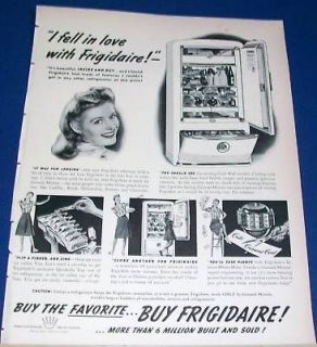 1941 Frigidaire Refrigerator vintage lady in love Ad