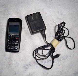   1600b TRACFONE WITH HOME CHARGER, BATTERY AND SIM CARD type RH 65