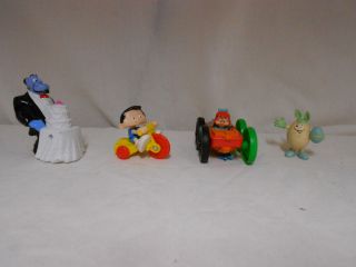   354   4 toys   Genie w/ Cake, Kid on Bike,Double side car,Egg figure