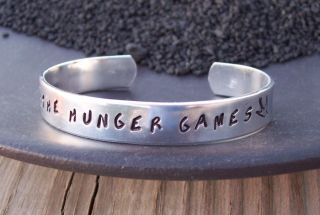 the hunger games bracelet in Jewelry & Watches