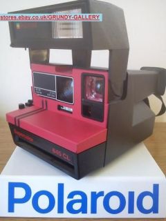  SUPERCOLOR 645CL RED INSTANT CAMERA. PX600 FILM COMPATIBLE