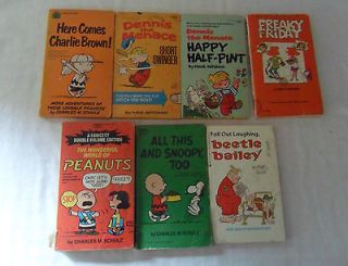 Lot of 7 Paperbacks Snoopy Peanuts Charlie Bronw Dennis the Menace 