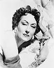 Gloria Swanson as Norma Desmond holding glass in Sunset Boulevard 