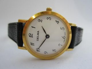 Delma N.O.S. womens watch white dial yellow plated case