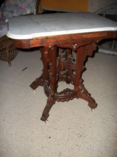   victorian eastlake walnut marble top stand with round stretcher base