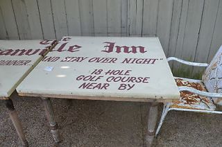 vintage table ornate wood legs granville inn metal sign garden square