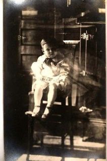 pre 1920s rppc BABY IN HIGH CHAIR HOLDING TRUMPET HORN   music 