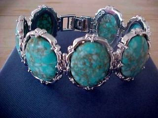 Claudia Agudelo Sim verigated Turquoise Silvertone bracelet