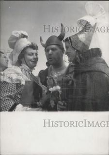   Photo Girl From Normandy In National Dress and Vikings in costume