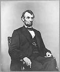 President Abraham Lincoln,hair parted,right,five dollar bill portrait 