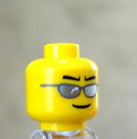   Minifig Head with Black Mouth & Eye Brow, Reflective Glasses Pattern