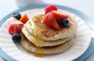 Small stacked pancakes with raisins   Tesco Real Food 