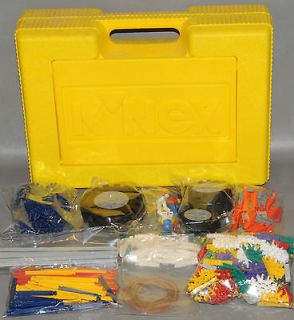 large lot of k nex pieces in yellow carrying case