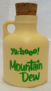 old plastic mountain dew jug with cork 