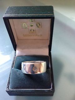 mens solid silver millenium ring from united kingdom time left