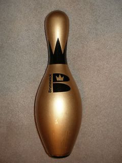 brunswick gold bowling pin with a black crown new time