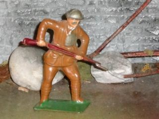 RARE AMERICAN METAL LEAD TOY SOLDIER IN GAS MASK BAYONETING