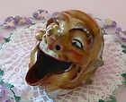 vintage french man with bee on nose smoker ashtray enlarge