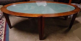 oval wood and glass coffee table  45