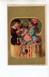 X012 Advertising Trade Card Children playing with Dolls Paris W C & W