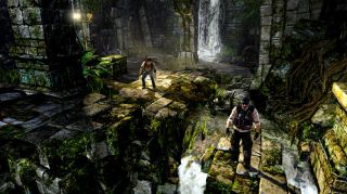 Nathan Drake following a companion in Uncharted Golden Abyss