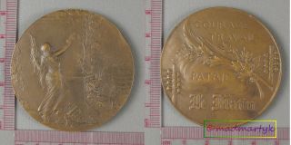 You are bidding on a France 50MM Le Matin Bronze Medal by Riberon 