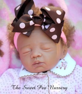   Baby Doll AA Biracial Girl loads of rooted curls from Anna kit