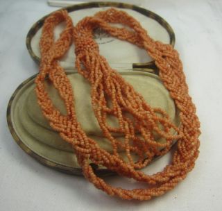 Original 1920s Flapper four string coral tasselled plaited Necklace
