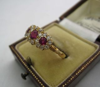 SUMPTIOUS Victorian Rubies and Diamonds 18ct Triple cluster Ring