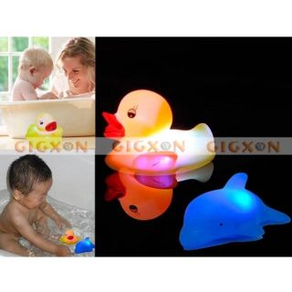 Baby Bath Fun LED Flashing Duck Dolphin Toy Rubber Light It Up Touch 
