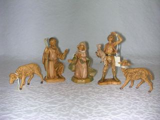 Figures. You will get Mary, Joseph, Micah The Shepherd and 2 