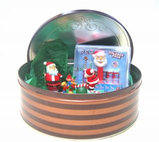 Tin Can Assortment of 3 Items Santa Claus Pez Avon Christmas Ornament 