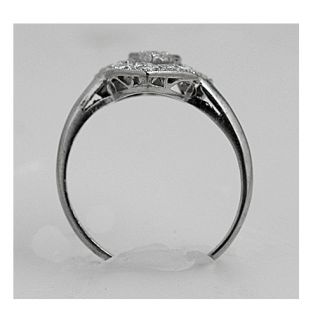 Buy her this exquisite diamond ring which will go beyond her dreams