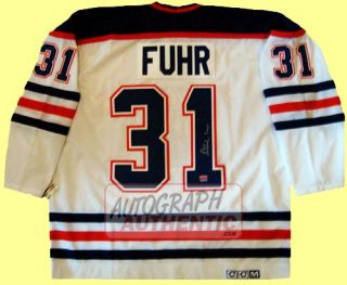 Edmonton Oilers jersey autographed by Grant Fuhr. The jersey is semi 