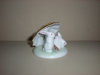 vintage hollohaza porcelain rabbits under umbrella figurine from 