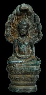Ancient Charm Buddha Statue in Shadow of Naga Lopburee Art Thai Wealth 