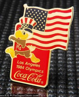   PINS 1984 LOS ANGELES COKE SPONSOR MASCOT SAM WITH USA FLAG NOC