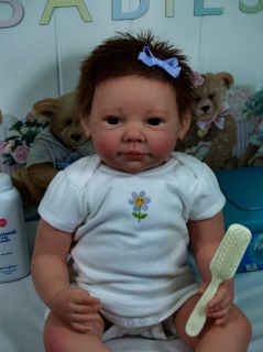 This precious girl started out as the Chloe doll kit sculpted by the