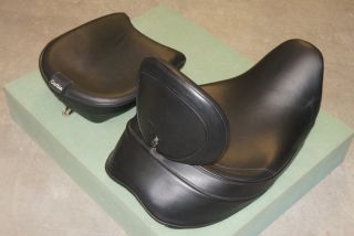 Corbin Leather seat and matchingremovable/adjustable backrest.