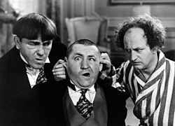 larry fine right with moe howard and curly howard in 1938 s healthy