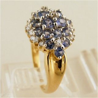  tanzanite and diamond ring has 1.25 carats of round cut