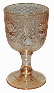 our wonderful hard to obtain iridescent iris wine goblet was made by