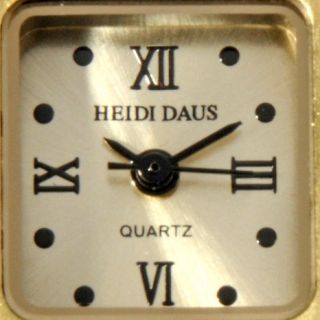 Heidi Daus Covered Dial Crystal Bow 9 Strap Watch