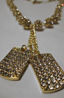  dog tags necklace in gold with clear stones 10mm $ 149 99 converter