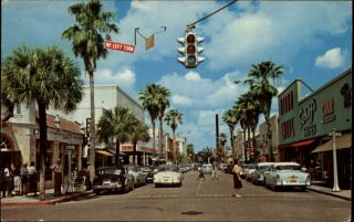Fort Pierce FL Street Scene Cars Traffic Light Store Signs Postcard