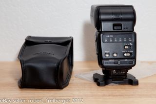 items included in this auction canon 420ex speedlight soft case flash