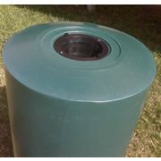 Place the rain barrel under your downspout, attach your garden or
