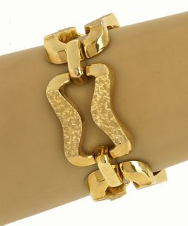this is a hefty 14k gold italian made large ladies engraved bracelet